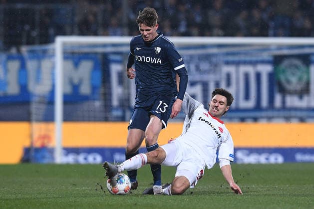 Soccer 2 Bundesliga 23 Matchday VfL Bochum 1 FC Nürnberg on 20 02 2026 at Vonovia Ruhrstadion in Bochum Oliver Olsen Bochum , left Tom Baack Nürnberg , right DFL regulations prohibit any use of photographs as image sequences and or quasi video xRx