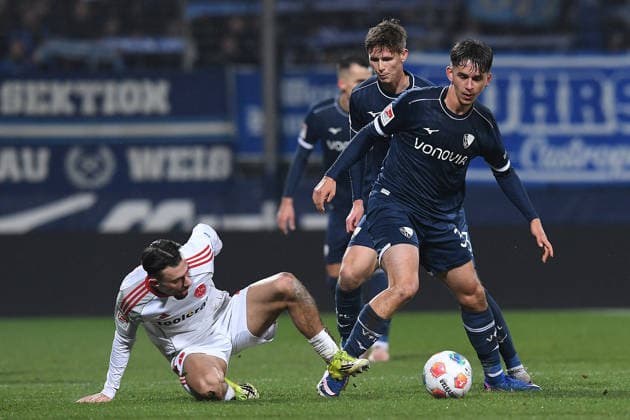Soccer 2 Bundesliga 23 Matchday VfL Bochum 1 FC Nuremberg on 20 02 2026 at Vonovia Ruhrstadion in Bochum Berkay Yilmaz Nuremberg , left Cajetan Lenz Bochum , right DFL regulations prohibit any use of photographs as image sequences and or quasi video xRx