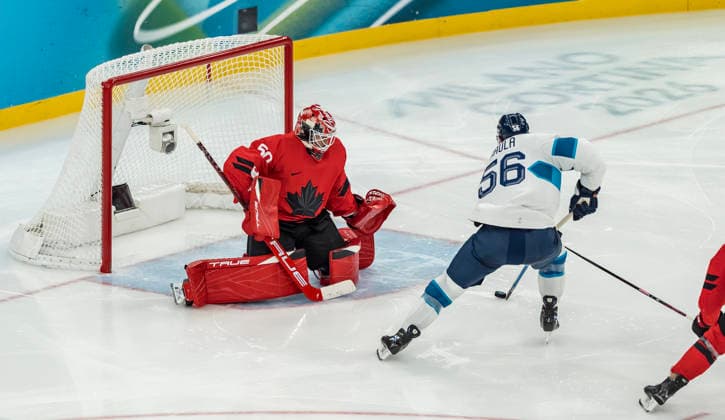 February 20, 2026, Milan, Lombardy, Italy: Goalkeeper Jordan Binnington 50 of Team Canada saves a goal against Team Finland in the Mens Team Canada Vs Team Finland Play-offs Semifinals game at the Milano Santagiulia Ice hockey, Eishockey Arena in MILAN, Italy during the 2026 Milano Cortina Winter Olympics. Team Canada advances to the finals, winning against Team Finland, 3:2 in regulation play. Milan Italy - ZUMAa161 20260220_oly_a161_036 Copyright: xWalterxG.xArcex