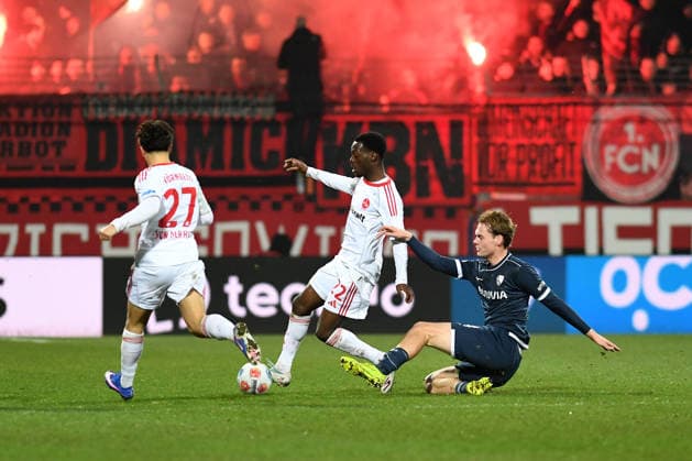 Rabby Nzingoula 1 FC Nuernberg and Mats Pannewig VfL Bochum in a duel during the 2 Bundesliga match between VfL Bochum and 1 FC Nürnberg, Vonovia Ruhrstadion on February 20, 2026 in Bochum, Germany Photo by Ralf Treese DeFodi Images Rabby Nzingoula 1 FC Nuernberg and Mats Pannewig VfL Bochum battle for the ball during the 2 Bundesliga match between VfL Bochum and 1 FC Nürnberg at Vonovia Ruhrstadion on February 20, 2026 in Bochum, Germany Photo by Ralf Treese DeFodi Images Photo by Ralf Treese DeFodi Images