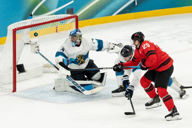 Ice hockey, Eishockey - Milano Cortina 2026 Winter Olympics: Day 14 Juuse Saros, Niko Mikkola, Nathan MacKinnon during Milano Cortina 2026 Winter Olympics Semi-final Men s Hockey Canada vs Finland match at Milano Santagiulia Ice Hockey Arena in Milan on February 20, 2026 Milan Italy  Copyright: xFotoxOlimpikx originalFilename:jastrzebowski-icehocke260220_npwRm.jpg