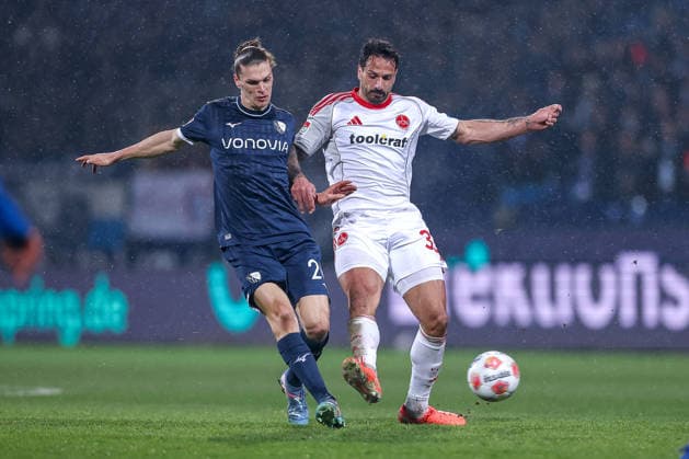 20 02 2026, Football, VfL Bochum 1 FC Nuremberg, 2 Fußball Bundesliga, 23 Matchday, Vonovia Ruhrstadion, Season 2025 2026 Noah Loosli VfL Bochum 20 in duel against Adriano Grimaldi 1FC Nuernberg 33 DFB regulations prohibit any use of photographs as image sequences and or quasi video Nordrhein Westfalen Germany