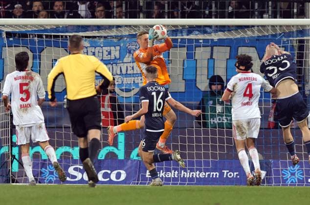 20 02 2026 Soccer Season 2025 2026 2 Soccer Bundesliga 23 Matchday VfL Bochum 1 FC Nuremberg FCN Club Sportfoto Zink DaMa xdaxmax DFL regulations prohibit any use of photographs as image sequences and or quasi video only for editorial use Jan Reichert 1, 1 FC Nuremberg FCN clears ball in front of Callum Marshall 16, VfL Bochum