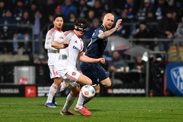 Fabio Gruber 1 FC Nuernberg and Philipp Hofmann VfL Bochum in a duel during the 2 Bundesliga match between VfL Bochum and 1 FC Nürnberg, Vonovia Ruhrstadion on February 20, 2026 in Bochum, Germany Photo by Ralf Treese DeFodi Images Fabio Gruber 1 FC Nuernberg and Philipp Hofmann VfL Bochum battle for the ball during the 2 Bundesliga match between VfL Bochum and 1 FC Nürnberg at Vonovia Ruhrstadion on February 20, 2026 in Bochum, Germany Photo by Ralf Treese DeFodi Images Photo by Ralf Treese DeFodi Images