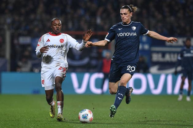 Soccer 2 Bundesliga 23 Matchday VfL Bochum 1 FC Nürnberg on 20 02 2026 at Vonovia Ruhrstadion in Bochum Mohamed Ali Zoma Nürnberg , left Noah Loosli Bochum , right DFL regulations prohibit any use of photographs as image sequences and or quasi video xRx