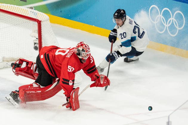 20th February 2026; Milan, Lombardy, Italy, 2026 Winter Olympic Games, Olympische Spiele, Olympia, OS Day Fifteen; Men s Hockey Semi-final Canada vs Finland; Jordan Binnington (CAN), Sebastian Aho (FIN)  FotoxOlimpik