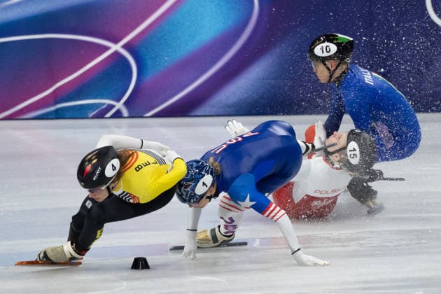 February 20, 2026, Milano, Lombardy, Italy: Kristen Santos-Griswold (1) of the United States, Kamila Sellier (15) of Poland and Arianna Fontana (10) of Italy crash in the Short Track Speed skating, Eisschnelllauf Women 1500m quarterfinals during the 2026 Winter Olympics at the Milano Ice Skating Arena on Friday in Milano. Milano Italy - ZUMAj89_ 20260220_oly_j89_003 Copyright: xPaulxKitagakixJr.x