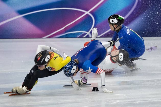 February 20, 2026, Milano, Lombardy, Italy: Kristen Santos-Griswold (1) of the United States, Kamila Sellier (15) of Poland and Arianna Fontana (10) of Italy crash in the Short Track Speed skating, Eisschnelllauf Women 1500m quarterfinals during the 2026 Winter Olympics at the Milano Ice Skating Arena on Friday in Milano. Milano Italy - ZUMAj89_ 20260220_oly_j89_006 Copyright: xPaulxKitagakixJr.x