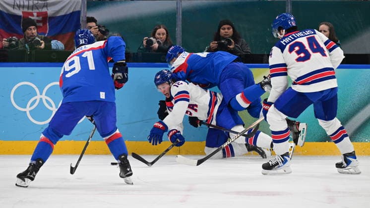 XXV Winter Olympic Games, Olympische Spiele, Olympia, OS in Milan, Italy, on February 20, 2026. Men s Ice hockey, Eishockey semifinal, USA vs Slovakia. From left Matus Sukel of Slovakia, Matt Boldy of USA, Martin Fehervary of Slovakia and Auston Matthews of USA. (CTKxPhoto MichalxKamaryt) CTKPhotoP2026022011097  CTKPhotoP2026022011097