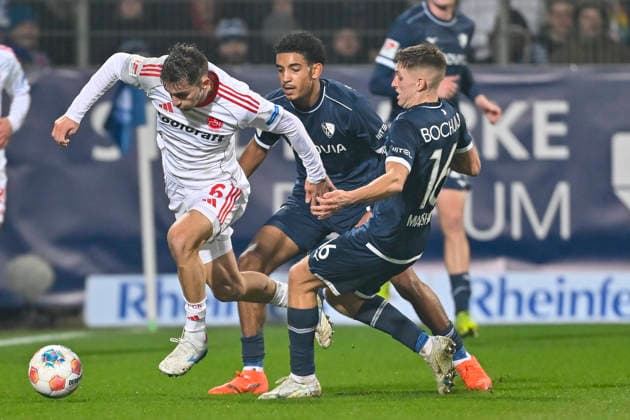 v li fighting for the ball Adam Markhiev Nuernberg 6 Francis Onyeka Bochum 21 Callum Marshall Bochum 16 20 02 2026 Soccer VfL Bochum vs 1 FC Nuernberg, Vonovia Ruhrstadion, Bochum, DFB DFL REGULATIONS PROHIBIT ANY USE OF PHOTOGRAPHS AS IMAGE SEQUENCES AND OR QUASI VIDEO Copyright: xpepphotox xHorstxMauelshagenx pep00321, pep_20260220_hm_284840