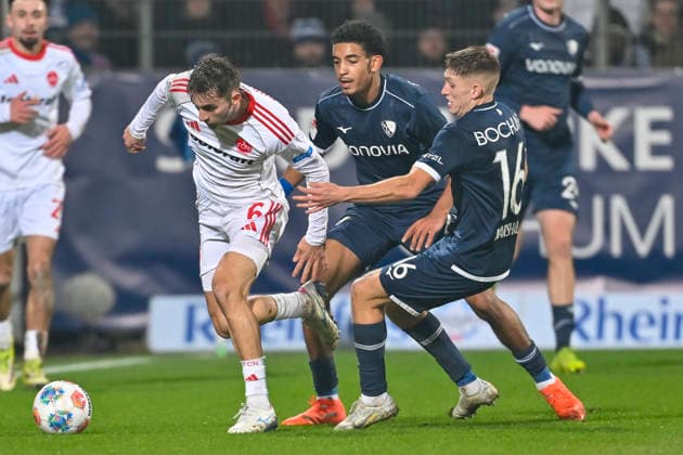 v li fighting for the ball Adam Markhiev Nuernberg 6 Francis Onyeka Bochum 21 Callum Marshall Bochum 16 20 02 2026 Soccer VfL Bochum vs 1 FC Nuernberg, Vonovia Ruhrstadion, Bochum, DFB DFL REGULATIONS PROHIBIT ANY USE OF PHOTOGRAPHS AS IMAGE SEQUENCES AND OR QUASI VIDEO Copyright: xpepphotox xHorstxMauelshagenx pep00321, pep_20260220_hm_284841