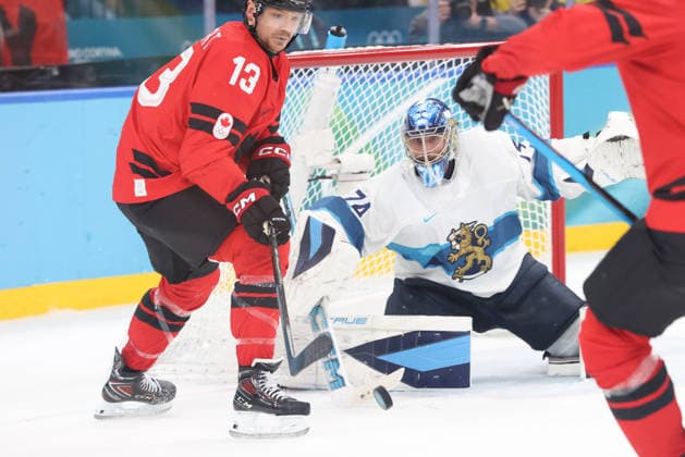 February 20, 2026: Juuse Saros (74) of Finland makes a save while Sam Reinhart (13) of Canada looks for a rebound during the Mens Ice hockey, Eishockey Semifinal game between Canada and Finland held at Milano Santagiulia Ice Hockey Arena during the Milano Cortina 2026 Olympic Games, Olympische Spiele, Olympia, OS in Milan, Italy. MilanoCortina2026 Olympics Milano Cortina 2026: Canada Vs Finland Mens Ice Hockey Semifinals Feb 20  - ZUMAc04_ 20260220_zma_c04_023 Copyright: xDanielxLeax