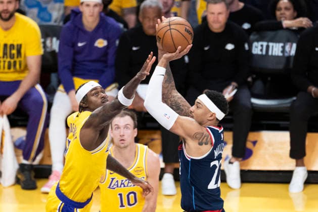 February 20, 2026, Los Angeles, California, USA: Los Angeles Clippers Jordan Miller (22) shoots against Los Angeles LakersÃ¢â‚¬â ¢ Jarred Vanderbilt (2) during an NBA, Basketball Herren, USA basketball game at Crypto.com Arena on Friday, Feb. 20, 2026 in Los Angeles. Los Angeles USA - ZUMAc68_ 20260220_zaf_c68_016 Copyright: xRingoxChiux