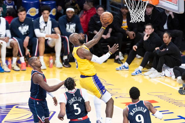 February 20, 2026, Los Angeles, California, USA: Los Angeles LakersÃ¢â‚¬â ¢ LeBron James (23) goes past the Los Angeles Clippers to the basket during an NBA, Basketball Herren, USA basketball game at Crypto.com Arena on Friday, Feb. 20, 2026 in Los Angeles. Los Angeles USA - ZUMAc68_ 20260220_zaf_c68_020 Copyright: xRingoxChiux