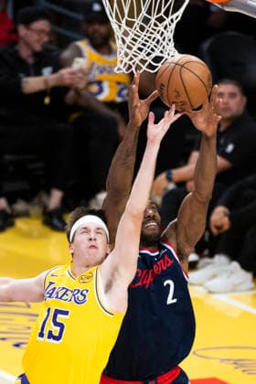 February 20, 2026, Los Angeles, California, USA: Los Angeles Clippers Kawhi Leonard (2) and Los Angeles LakersÃ¢â‚¬â ¢ Austin Reaves (15) vie for the ball during an NBA, Basketball Herren, USA basketball game at Crypto.com Arena on Friday, Feb. 20, 2026 in Los Angeles. Los Angeles USA - ZUMAc68_ 20260220_zaf_c68_048 Copyright: xRingoxChiux