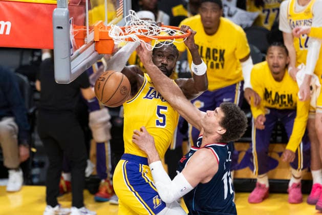 February 20, 2026, Los Angeles, California, USA: Los Angeles LakersÃ¢â‚¬â ¢ Deandre Ayton (5) dunks against Los Angeles Clippers Brook Lopez (11) during an NBA, Basketball Herren, USA basketball game at Crypto.com Arena on Friday, Feb. 20, 2026 in Los Angeles. Los Angeles USA - ZUMAc68_ 20260220_zaf_c68_060 Copyright: xRingoxChiux