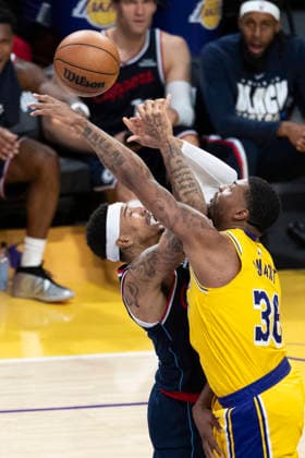 February 20, 2026, Los Angeles, California, USA: Los Angeles Clippers Jordan Miller (22) shoots against Los Angeles LakersÃ¢â‚¬â ¢ Marcus Smart (36) during an NBA, Basketball Herren, USA basketball game at Crypto.com Arena on Friday, Feb. 20, 2026 in Los Angeles. Los Angeles USA - ZUMAc68_ 20260220_zaf_c68_063 Copyright: xRingoxChiux