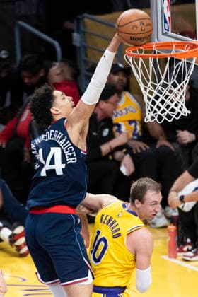 February 20, 2026, Los Angeles, California, USA: Los Angeles Clippers Yanic Konan NiederhoÂ¤user (14) dunks against Los Angeles LakersÃ¢â‚¬â ¢ Luke Kennard (10) during an NBA, Basketball Herren, USA basketball game at Crypto.com Arena on Friday, Feb. 20, 2026 in Los Angeles. Los Angeles USA - ZUMAc68_ 20260220_zaf_c68_064 Copyright: xRingoxChiux