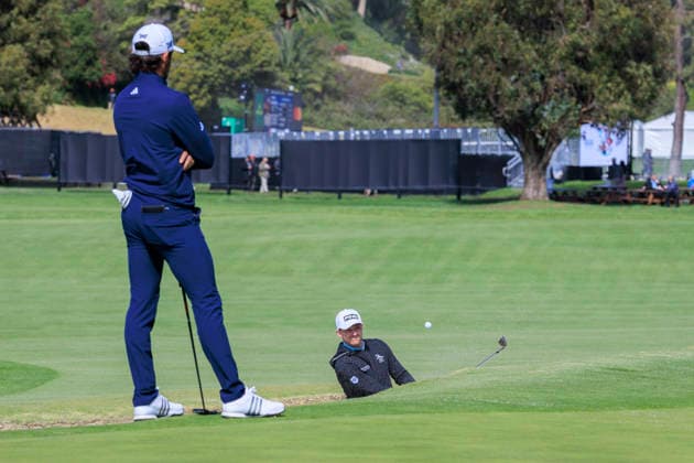 February 20, 2026, Pacific Palisades, California, USA: Brian Campbell makes a bunker shot as Marco Penge observes during Round 2 of the 2026 Genesis Invitational Golf Tournament on Friday February 20, 2026 at the Riviera Country Club in Pacific Palisades, California. ARIANA RUIZ PI Pacific Palisades USA - ZUMAp124 20260220_zaa_p124_042 Copyright: xArianaxRuizx