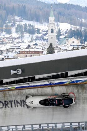 OLYMPICS - Winter Olympic Games, Olympische Spiele, Olympia, OS Milano Cortina 2026 CORTINA D AMPEZZO,ITALY,21.FEB.26 - OLYMPICS, BOBSLEIGH - Winter Olympic Games Milano Cortina 2026, 4-man, heat 1 and 2, men. Image shows Markus Treichl, Markus Sammer, Sascha Stepan and Kristian Huber (AUT).  GEPAxpictures xAlexanderxSolc