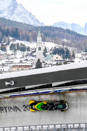 OLYMPICS - Winter Olympic Games, Olympische Spiele, Olympia, OS Milano Cortina 2026 CORTINA D AMPEZZO,ITALY,21.FEB.26 - OLYMPICS, BOBSLEIGH - Winter Olympic Games Milano Cortina 2026, 4-man, heat 1 and 2, men. Image shows Shane Pitter, Junior Harris, Tyquendo Tracey and Joel Fearon (JAM).  GEPAxpictures xAlexanderxSolc