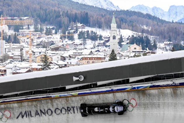 OLYMPICS - Winter Olympic Games, Olympische Spiele, Olympia, OS Milano Cortina 2026 CORTINA D AMPEZZO,ITALY,21.FEB.26 - OLYMPICS, BOBSLEIGH - Winter Olympic Games Milano Cortina 2026, 4-man, heat 1 and 2, men. Image shows Youngjin Suk, Byungdo Chae, Suhyun Chun and Doyun Lee (KOR).  GEPAxpictures xAlexanderxSolc