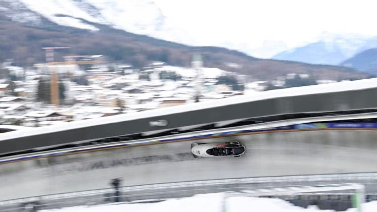 OLYMPICS - Winter Olympic Games, Olympische Spiele, Olympia, OS Milano Cortina 2026 CORTINA D AMPEZZO,ITALY,21.FEB.26 - OLYMPICS, BOBSLEIGH - Winter Olympic Games Milano Cortina 2026, 4-man, heat 1 and 2, men. Image shows Jakob Mandlbauer, Daniel Bertschler, Sebastian Mitterer and Daiyehan Nichols-Bardi (AUT).  GEPAxpictures xAlexanderxSolc