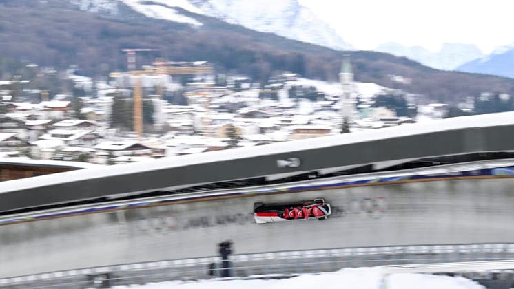OLYMPICS - Winter Olympic Games, Olympische Spiele, Olympia, OS Milano Cortina 2026 CORTINA D AMPEZZO,ITALY,21.FEB.26 - OLYMPICS, BOBSLEIGH - Winter Olympic Games Milano Cortina 2026, 4-man, heat 1 and 2, men. Image shows Axel Brown, De Aundre John, Shakeel John and Xaverri Williams (TTO).  GEPAxpictures xAlexanderxSolc