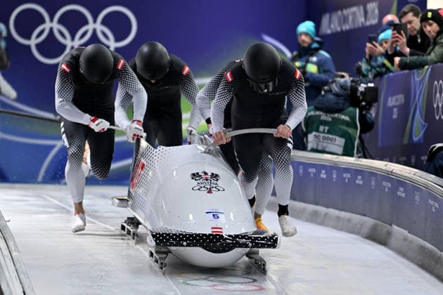 Cortina d Ampezzo, Italy, February 21th 2026. Markus Treichl, Markus Sammer, Sascha Stepan, Kristian Huber of Austria in action during the Bobsleight 4-man Heat 1 race of the Olympic Winter games, Winterspiele,Spiele, Summer games 2026 in Cortina d Ampezzo, Italy. (Photo by Igor Kupljenik Sports Press Photo)  Copyright: xIgorxKupljenikx xSPPx Sportspressphoto_SPR95325