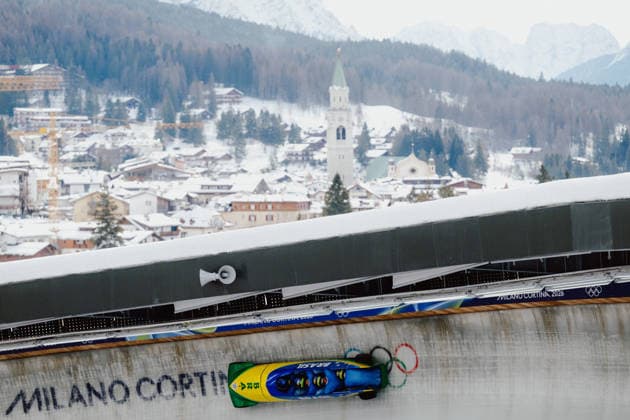 OLYMPICS - Winter Olympic Games, Olympische Spiele, Olympia, OS Milano Cortina 2026 CORTINA D AMPEZZO,ITALY,21.FEB.26 - OLYMPICS, BOBSLEIGH - Winter Olympic Games Milano Cortina 2026, 4-man, heat 1 and 2, men. Image shows Edson Luques Bindilatti (BRA), Davidson Henrique de Souza (BRA), Rafael Souza da Silva (BRA) and Luis Bacca Goncalves (BRA).  GEPAxpictures xAlexanderxSolc