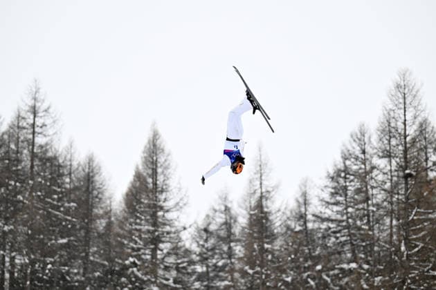 (260221) -- LIVIGNO, Feb. 21, 2026 -- Xu Mengtao of China competes during the freestyle skiing mixed team aerials final 1 at the Milan-Cortina 2026 Olympic Winter games, Winterspiele,Spiele, Summer games in Livigno, Italy, Feb. 21, 2026. ) (MICO2026)ITALY-LIVIGNO-OLYMPIC WINTER GAMES-FREESTYLE SKIING-MIXED TEAM AERIALS-FINAL ZhangxHongxiang 
