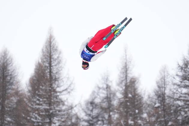 February 21, 2026, Livigno, Italy: Canada s Lewis Irving jumps during the mixed team aerials at the Milano Cortina 2026 Winter Olympic Games, Olympische Spiele, Olympia, OS in Livigno, Italy, Saturday, Feb. 21, 2026. Canada News - February 21, 2026  - ZUMAc35_ 20260221_zaf_c35_003 Copyright: xSeanxKilpatrickx