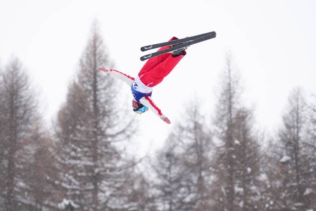 February 21, 2026, Livigno, Italy: Canada s Miha Fontaine jumps during the mixed team aerials at the Milano Cortina 2026 Winter Olympic Games, Olympische Spiele, Olympia, OS in Livigno, Italy, Saturday, Feb. 21, 2026. Canada News - February 21, 2026  - ZUMAc35_ 20260221_zaf_c35_004 Copyright: xSeanxKilpatrickx