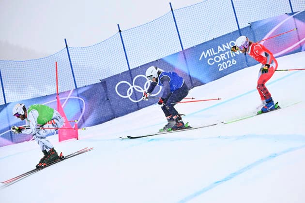 LIVIGNO, ITALY 20260221 Erik Mobärg (blue) with Alex Fiva, Switzerland (green) and Jared Schmidt, Canada (red) during the round of 16 heat 6 in the men s ski cross at the Snow Park in Livigno, Italy, Winter Olympics. *** The image is included in the SPORTS PACKAGE. For others PAYMENT IMAGE *** LIVIGNO ITALY x10080x *** LIVIGNO, ITALY 20260221 Erik Mobärg blue with Alex Fiva, Switzerland green and Jared Schmidt, Canada red during the round of 16 heat 6 in the men s ski cross at the Snow Park in Livigno, Italy, Winter Olympics The image is included in the SPORTS PACKAGE For others PAYMENT IMAGE LIVIGNO ITALY x10080x  Copyright: xFredrikxSandberg TTx 2026 OLYMPICS SKI CROSS FINAL