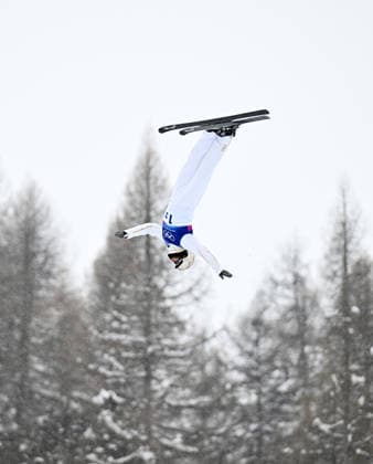 (260221) -- LIVIGNO, Feb. 21, 2026 -- Wang Xindi of China competes during the freestyle skiing mixed team aerials final 1 at the Milan-Cortina 2026 Olympic Winter games, Winterspiele,Spiele, Summer games in Livigno, Italy, Feb. 21, 2026. ) (MICO2026)ITALY-LIVIGNO-OLYMPIC WINTER GAMES-FREESTYLE SKIING-MIXED TEAM AERIALS-FINAL ZhangxHongxiang 