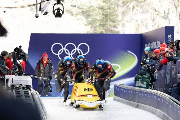 GER – Johannes Lochner, Thorsten Margis, Jörn Wenzel, Georg Fleischhauer, Viererbob der Männer bei den Olympischen Winterspielen Milano Cortina 2026 im Cortina Sliding Centre, Cortina dAmpezzo, Italien, am 21. Februar 2026. compete in the Mens Four-Man bobsleigh event at the Olympic Winter games, Winterspiele,Spiele, Summer games Milano Cortina 2026 at the Cortina Sliding Centre, Cortina dAmpezzo, Italy, on February 21, 2026. *** GER - Johannes Lochner, Thorsten Margis, Jörn Wenzel, Georg Fleischhauer, Mens Four Man bobsleigh at the Olympic Winter Games Milano Cortina 2026 at the Cortina Sliding Centre, Cortina dAmpezzo, Italy, on February 21, 2026 compete in the Mens Four Man bobsleigh event at the Olympic Winter Games Milano Cortina 2026 at the Cortina Sliding Centre, Cortina dAmpezzo, Italy, on February 21, 2026 Copyright: HMBxMedia MarcxNiemeyer