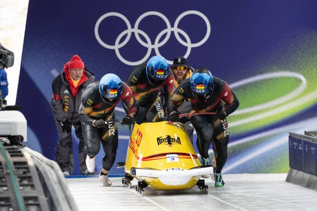 GER – Adam Ammour, Issam Ammour, Joshua Tasche, Alexander Schaller, Viererbob der Männer bei den Olympischen Winterspielen Milano Cortina 2026 im Cortina Sliding Centre, Cortina dAmpezzo, Italien, am 21. Februar 2026. compete in the Mens Four-Man bobsleigh event at the Olympic Winter games, Winterspiele,Spiele, Summer games Milano Cortina 2026 at the Cortina Sliding Centre, Cortina dAmpezzo, Italy, on February 21, 2026. *** GER - Adam Ammour, Issam Ammour, Joshua Tasche, Alexander Schaller, Mens Four Man bobsleigh at the Olympic Winter Games Milano Cortina 2026 at the Cortina Sliding Centre, Cortina dAmpezzo, Italy, on February 21, 2026 compete in the Mens Four Man bobsleigh event at the Olympic Winter Games Milano Cortina 2026 at the Cortina Sliding Centre, Cortina dAmpezzo, Italy, on February 21, 2026 Copyright: HMBxMedia MarcxNiemeyer