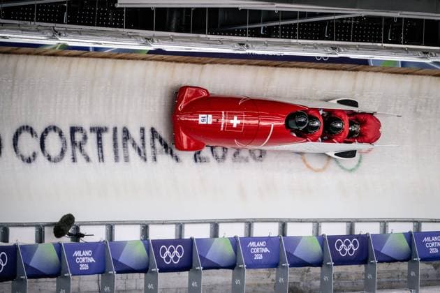 SUI – Timo Rohner, Pascal Moser, Mathieu Hersperger, Cyril Bieri, Viererbob der Männer bei den Olympischen Winterspielen Milano Cortina 2026 im Cortina Sliding Centre, Cortina dAmpezzo, Italien, am 21. Februar 2026. compete in the Mens Four-Man bobsleigh event at the Olympic Winter games, Winterspiele,Spiele, Summer games Milano Cortina 2026 at the Cortina Sliding Centre, Cortina dAmpezzo, Italy, on February 21, 2026. *** SUI - Timo Rohner, Pascal Moser, Mathieu Hersperger, Cyril Bieri, Mens Four Man bobsleigh at the Olympic Winter Games Milano Cortina 2026 at the Cortina Sliding Centre, Cortina dAmpezzo, Italy, on February 21, 2026 compete in the Mens Four Man bobsleigh event at the Olympic Winter Games Milano Cortina 2026 at the Cortina Sliding Centre, Cortina dAmpezzo, Italy, on February 21, 2026 Copyright: HMBxMedia MarcxNiemeyer