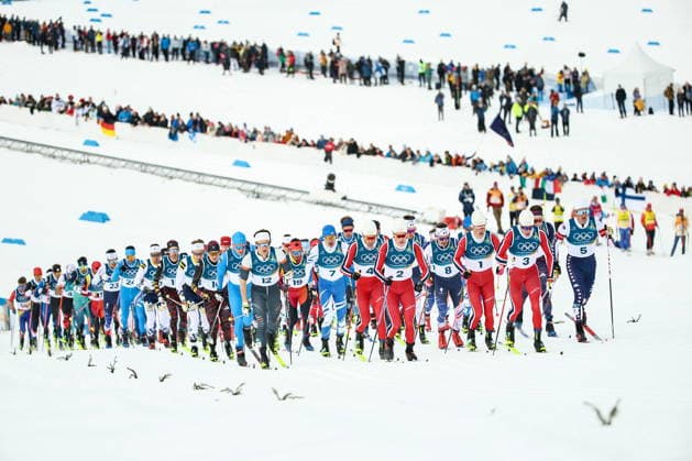 ITALY, TESERO - FEBRUARY 21, 2026: Athletes compete in the men s nross-nountry skiing 50km mass start classic event during the 2026 Winter Olympic Games, Olympische Spiele, Olympia, OS at the Cross-Country and Biathlon Centre Fabio Canal. Mikhail Tereshchenko TASS  89033032