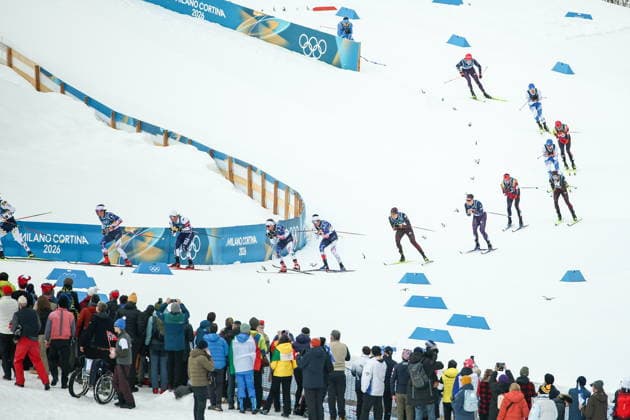 ITALY, TESERO - FEBRUARY 21, 2026: Athletes compete in the men s nross-nountry skiing 50km mass start classic event during the 2026 Winter Olympic Games, Olympische Spiele, Olympia, OS at the Cross-Country and Biathlon Centre Fabio Canal. Mikhail Tereshchenko TASS  89033033