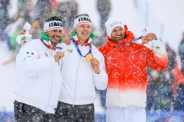 OLYMPICS - Winter Olympic Games, Olympische Spiele, Olympia, OS Milano Cortina 2026 LIVIGNO,ITALY,21.FEB.26 - OLYMPICS, FREE SKI, FREESTYLE SKIING - Winter Olympic Games Milano Cortina 2026, Skicross, men, final, medal ceremony. Image shows the rejoicing of the rejoicing of Federico Tomasoni, Simone Deromedis (ITA) and Alex Fiva (SUI).  GEPAxpictures xWolfgangxGrebien