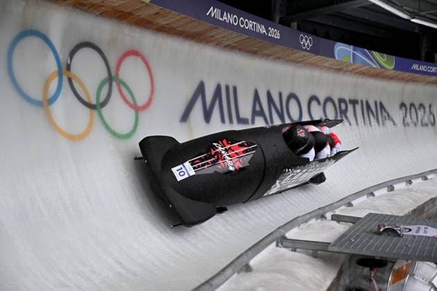 Cortina d Ampezzo, Italy, February 21th 2026. Taylor Austin, Keaton Bruggeling, Mike Evelyn, Shaquille Murray-Lawrence of Kanada in action during the Bobsleight 4-man Heat 2 race of the Olympic Winter games, Winterspiele,Spiele, Summer games 2026 in Cortina d Ampezzo, Italy. (Photo by Igor Kupljenik Sports Press Photo)  Copyright: xIgorxKupljenikx xSPPx Sportspressphoto_SPR95512