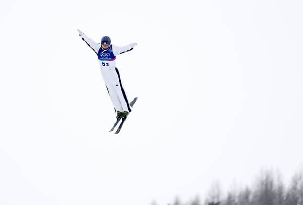 (260221) -- LIVIGNO, Feb. 21, 2026 -- Christopher Lillis of the United States competes during the freestyle skiing mixed team aerials final 1 at the Milan-Cortina 2026 Olympic Winter games, Winterspiele,Spiele, Summer games in Livigno, Italy, Feb. 21, 2026. ) (MICO2026)ITALY-LIVIGNO-OLYMPIC WINTER GAMES-FREESTYLE SKIING-MIXED TEAM AERIALS-FINAL WangxPeng 