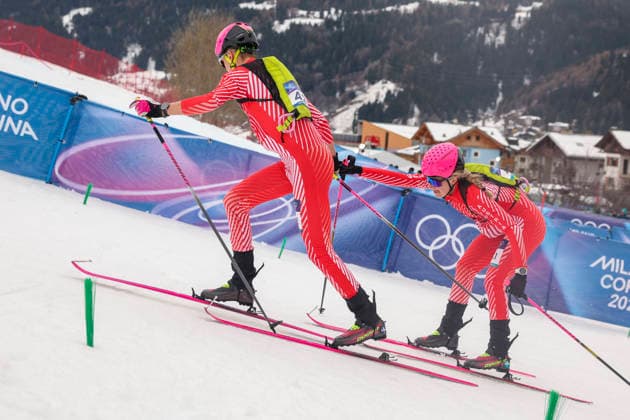 OLYMPICS - Winter Olympic Games, Olympische Spiele, Olympia, OS Milano Cortina 2026 BORMIO,ITALY,21.FEB.26 - OLYMPICS, SKI MOUNTAINEERING - Winter Olympic Games Milano Cortina 2026, Skicross, mixed relay, final. Image shows Paul Verbjnjak and Johanna Hiemer (AUT).  GEPAxpictures xHaraldxSteiner
