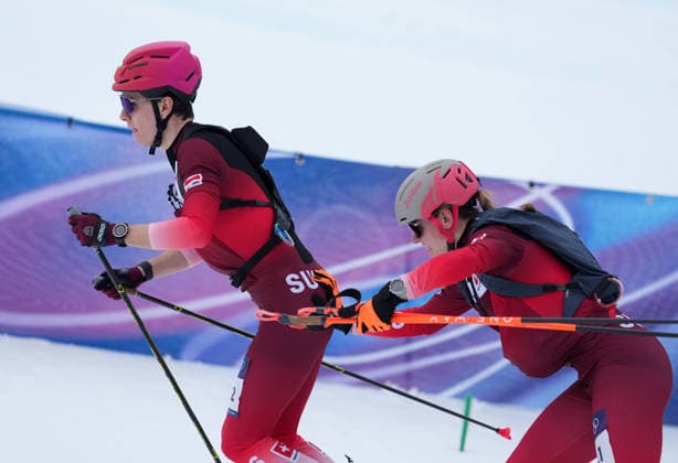 (260221) -- BORMIO, Feb. 21, 2026 -- Marianne Fatton of Switzerland and her teammate Jon Kistler (L) compete during the ski mountaineering mixed relay event at the Milan-Cortina 2026 Olympic Winter games, Winterspiele,Spiele, Summer games in Bormio, Italy, Feb. 21, 2026. ) (MICO2026)ITALY-BORMIO-OLYMPIC WINTER GAMES-SKI MOUNTAINEERING-MIXED RELAY HuxHuhu 