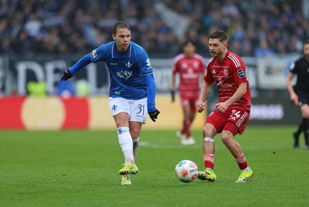 21 02 2026, Soccer 2 Bundesliga, SV Darmstadt 98 Fortuna Düsseldorf, emonline, emspor, despor, v l , Niklas Schmidt SV Darmstadt 98 , Florent Muslija Fortuna Düsseldorf DFL DFB REGULATIONS PROHIBIT ANY USE OF PHOTOGRAPHS AS IMAGE SEQUENCES AND OR QUASI VIDEO xdcx Copyright: HMBxMedia Claus