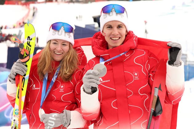 OLYMPICS - Winter Olympic Games, Olympische Spiele, Olympia, OS Milano Cortina 2026 BORMIO,ITALY,21.FEB.26 - OLYMPICS, SKI MOUNTAINEERING - Winter Olympic Games Milano Cortina 2026, Skicross, mixed relay, final, medal ceremony. Image shows the rejoicing of Marianne Fatton and Jon Kistler (SUI).  GEPAxpictures xHaraldxSteiner