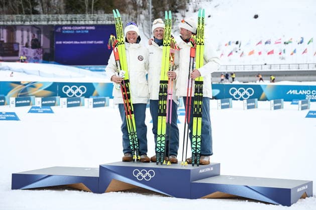 ITALY, TESERO - FEBRUARY 21, 2026: Silver medalist Martin Loewstroem Nyenget of Norway, gold medalist Johannes Hoesflot Klaebo of Norway and bronze medalist Emil Iversen (L-R) of Norway pose during a victory ceremony for the men s nross-nountry skiing 50km mass start classic event during the 2026 Winter Olympic Games, Olympische Spiele, Olympia, OS at the Cross-Country and Biathlon Centre Fabio Canal 2026 Winter Olympics: Cross-Country Skiing  - ZUMAt113 20260221_zaa_t113_292 Copyright: xMikhailxTereshchenkox