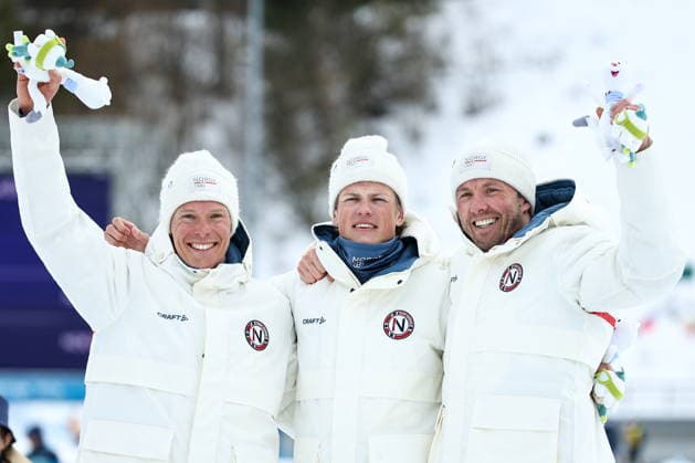 ITALY, TESERO - FEBRUARY 21, 2026: Silver medalist Martin Loewstroem Nyenget of Norway, gold medalist Johannes Hoesflot Klaebo of Norway and bronze medalist Emil Iversen (L-R) of Norway pose during a victory ceremony for the men s nross-nountry skiing 50km mass start classic event during the 2026 Winter Olympic Games, Olympische Spiele, Olympia, OS at the Cross-Country and Biathlon Centre Fabio Canal 2026 Winter Olympics: Cross-Country Skiing  - ZUMAt113 20260221_zaa_t113_293 Copyright: xMikhailxTereshchenkox