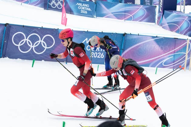 February 21, 2026, Milan, Lombardy, Italy: MARIANNE FATTON pushes her teammate JON KISTLER Team Switzerland moments after Team France Mountaineering Team Relay at the Stelvio Ski Centre during the 2026 Milano Cortina Winter Olympics. Milan Italy - ZUMAa19_ 20260221_oly_a19_005 Copyright: xAngelxAdamsx
